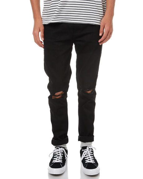 black jeans with holes in knees