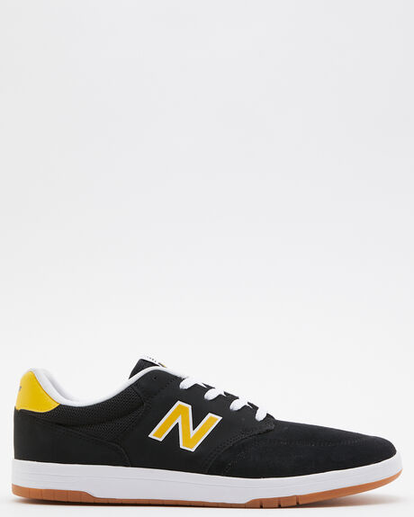 New balance black yellow top