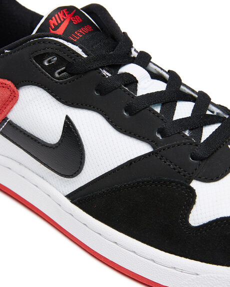 black nike sneakers with white swoosh