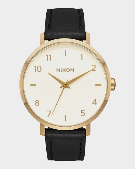 Nixon gold black top