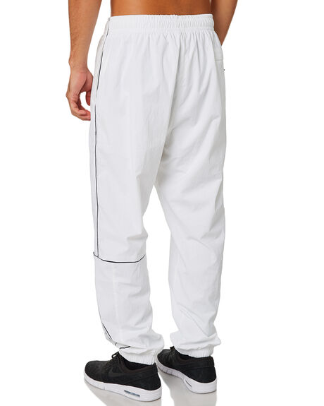 blue and white nike pants