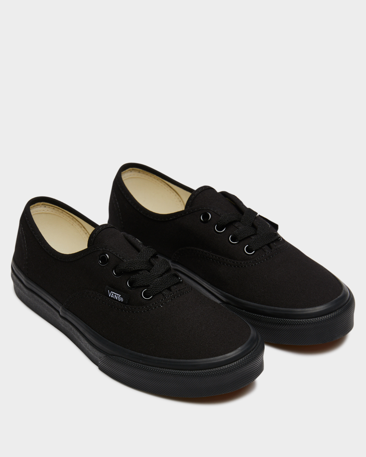 youth black and white vans