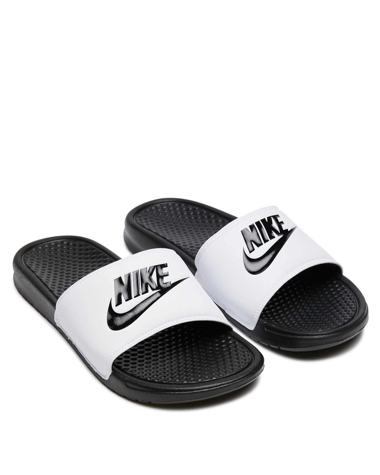 grey and white nike sandals