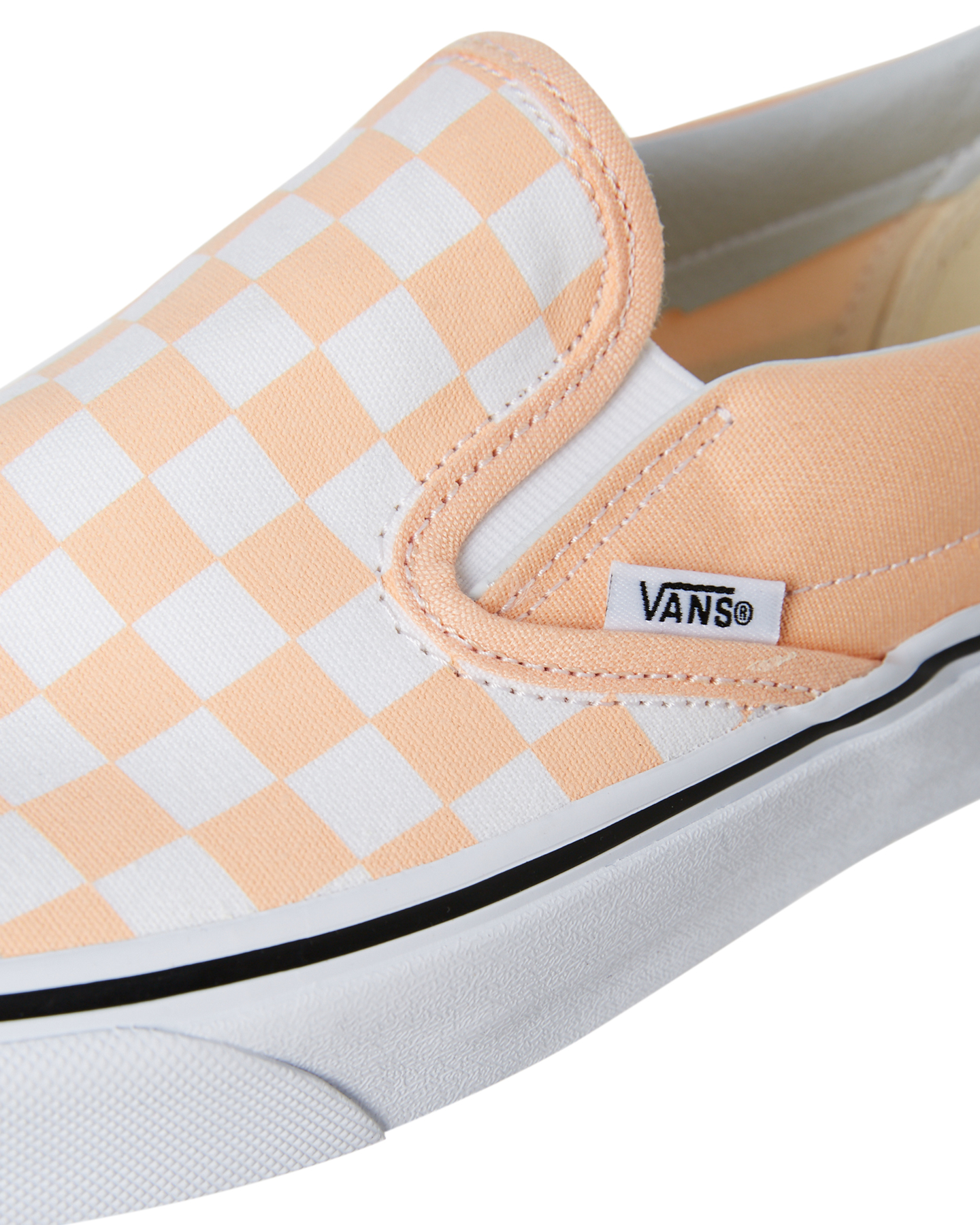 pink and black vans slip ons