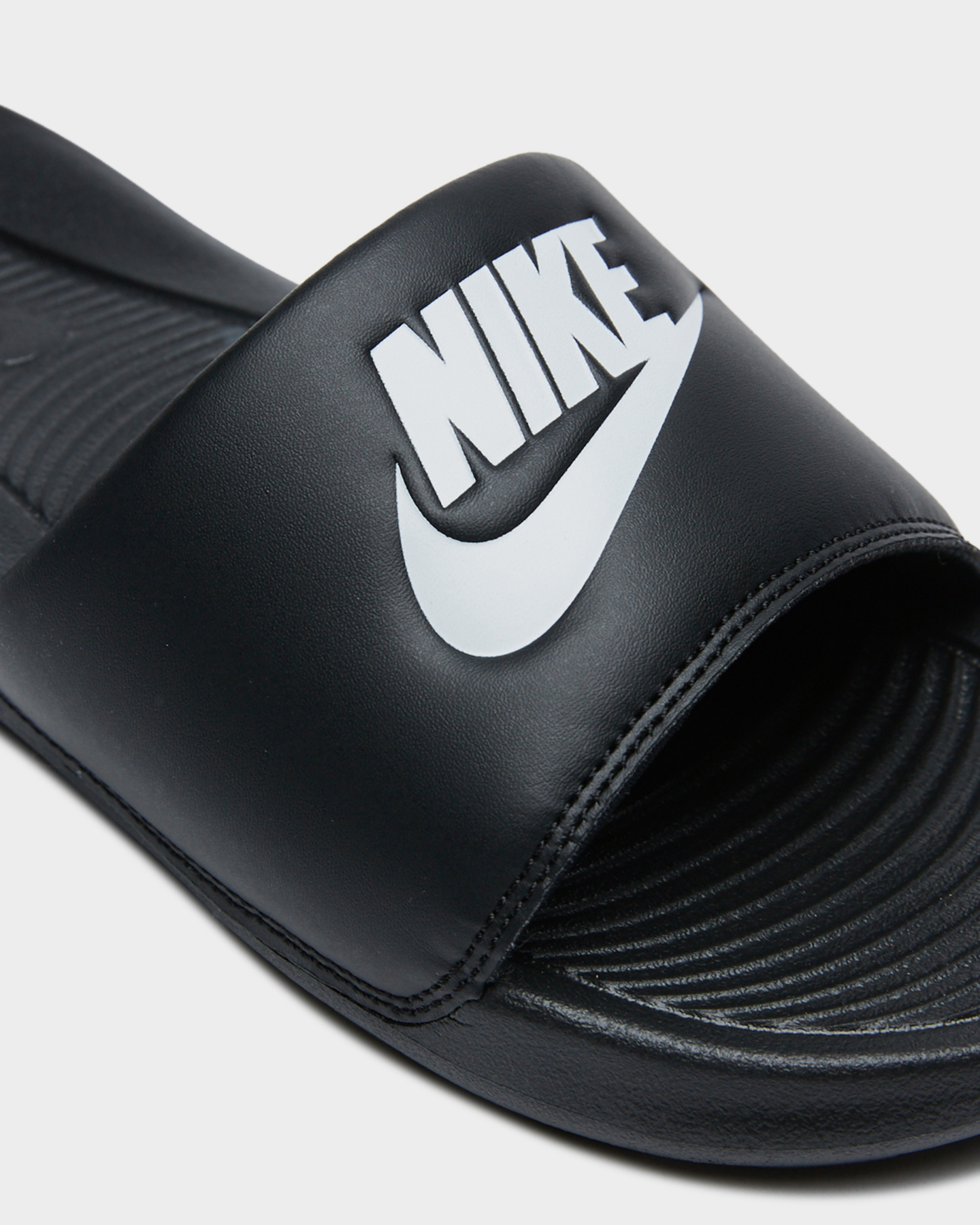 black on black nike slides